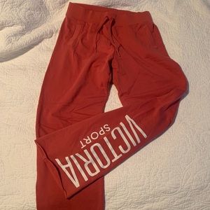 Victoria Sport sweatpants in a punch pink color